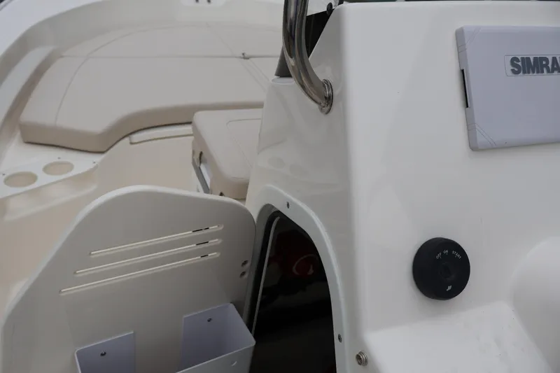 Slide: The Image of 2026 Boston Whaler 190 Montauk boat interior with seating and control panel. - 14