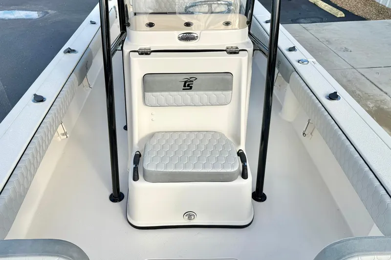 Slide: The Image of 2026 Carolina Skiff 26 Ultra Elite boat interior with cushioned seating and sleek design. - 19