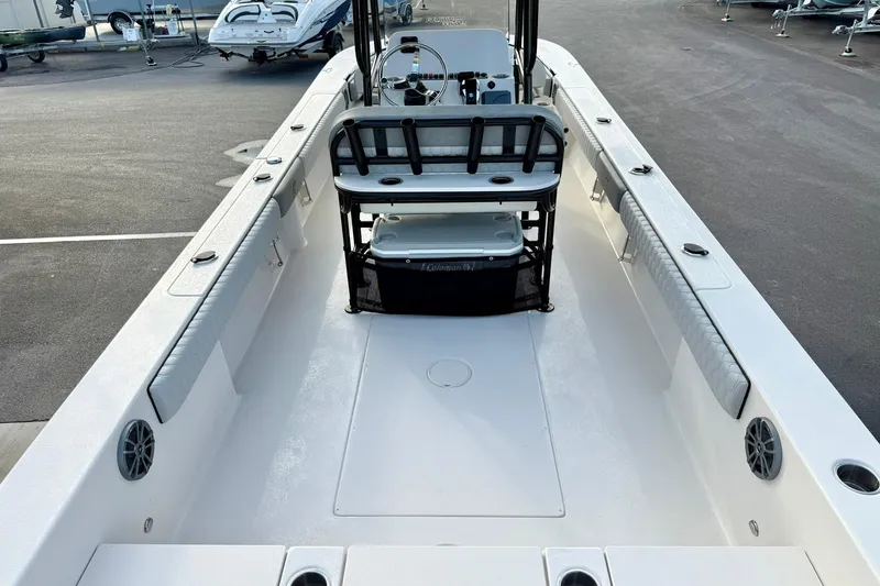 Slide: The Image of 2026 Carolina Skiff 26 Ultra Elite boat interior with seating and storage. - 42