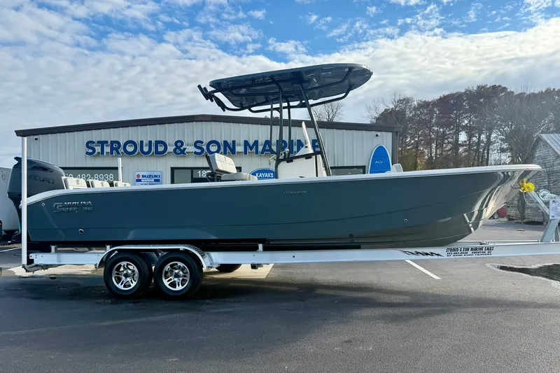 Slide: The Image of 2026 Carolina Skiff 26 Ultra Elite boat on trailer at Stroud & Son Marine. - 7