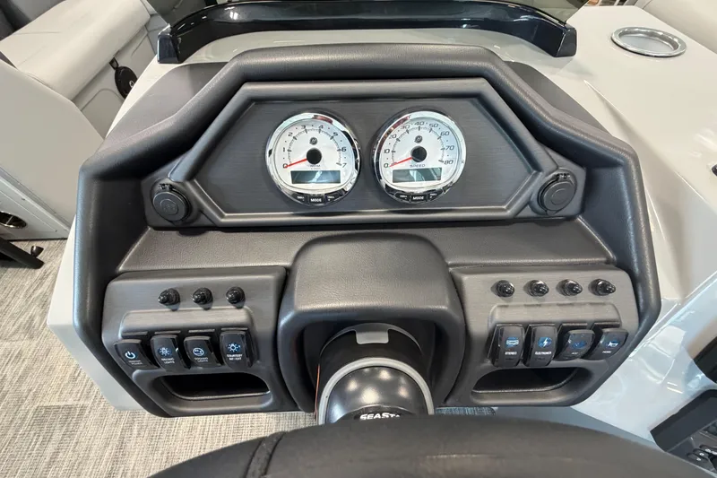 Slide: The Image of Dashboard of 2026 Bentley Pontoons Legacy 243 Swingback with gauges and controls. - 11