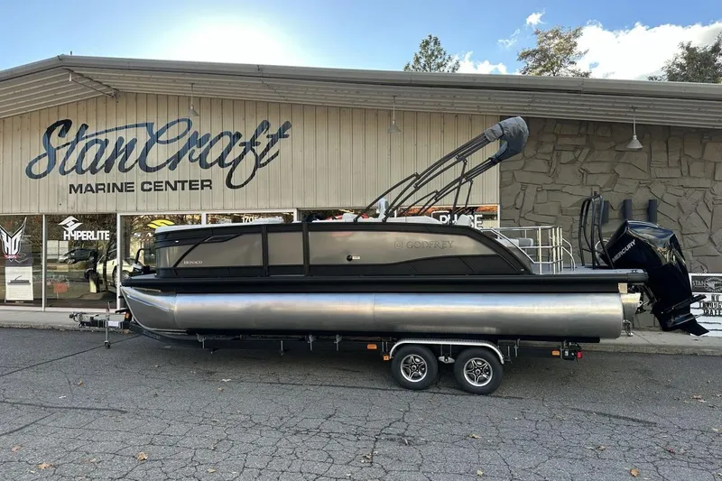 The Image of 2026 Godfrey Monaco 235 SFL pontoon boat on trailer at StanCraft Marine Center. - 1