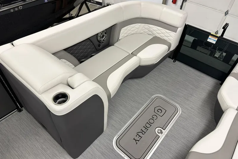 Slide: The Image of Luxurious seating on 2026 Godfrey Monaco 235 SFL boat, featuring elegant upholstery and modern design. - 10