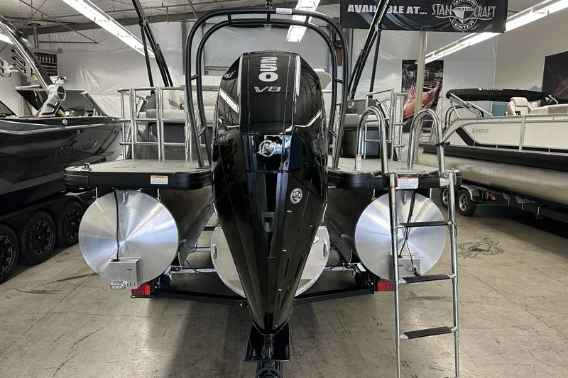 Slide: The Image of 2026 Godfrey Monaco 235 SFL pontoon boat with powerful V8 engine in showroom. - 13