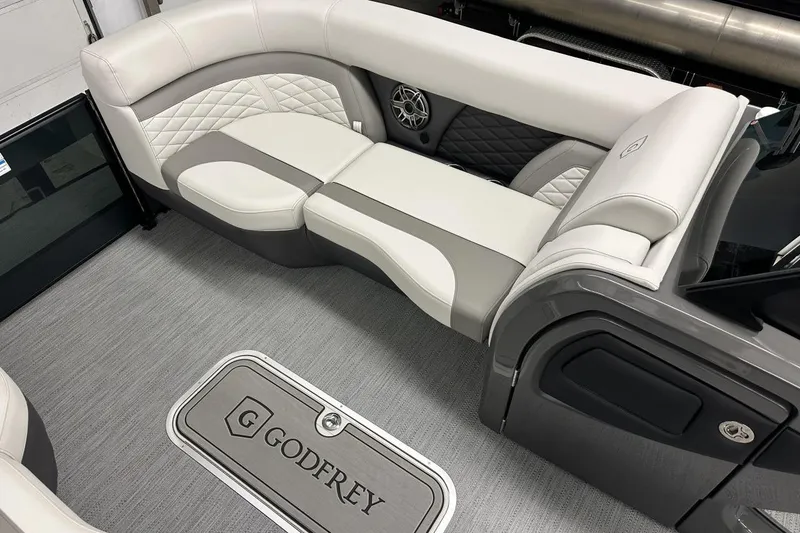 Slide: The Image of Luxurious interior of 2026 Godfrey Monaco 235 SFL pontoon boat with elegant seating. - 9