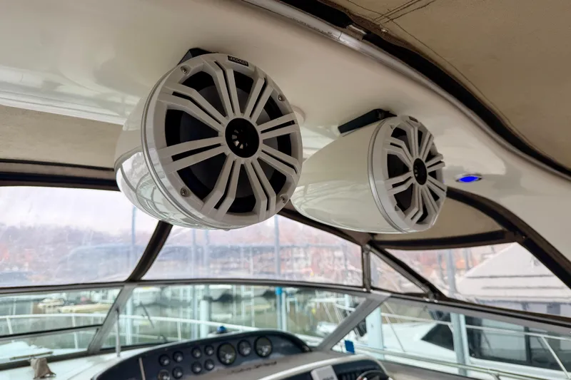 Slide: The Image of Speakers installed on a 1995 Sea Ray 370 Sundancer boat's interior ceiling. - 19