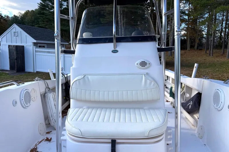 Slide: The Image of 2004 Grady-White Fisherman 180 boat interior with white seating and console. - 6