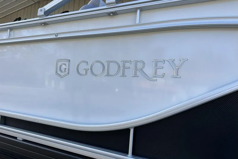 Slide: The Image of 2026 Godfrey Sweetwater 2286 SFLC boat with logo detail. - 13
