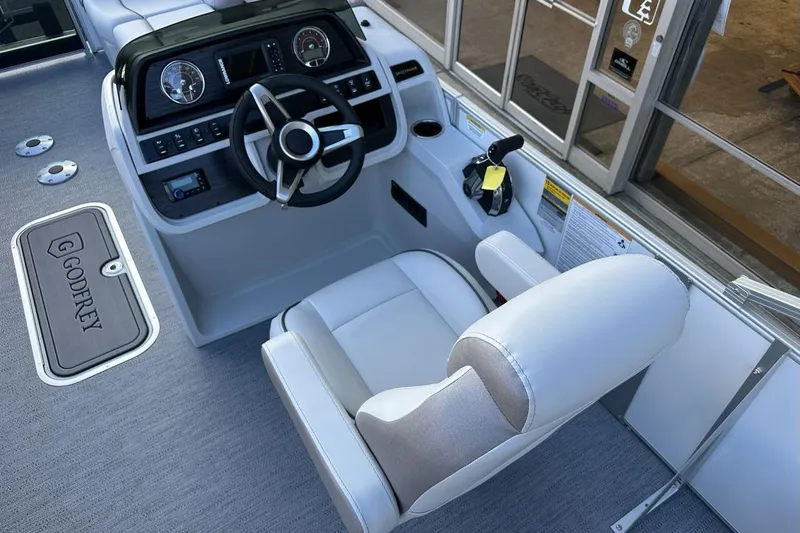 Slide: The Image of Captain's helm of 2026 Godfrey Sweetwater 2286 SFLC pontoon boat, featuring modern controls. - 5