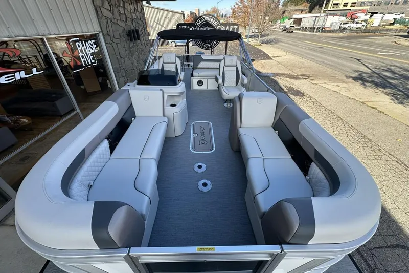 Slide: The Image of 2026 Godfrey Sweetwater 2286 SFLC pontoon boat with spacious seating and modern design. - 9