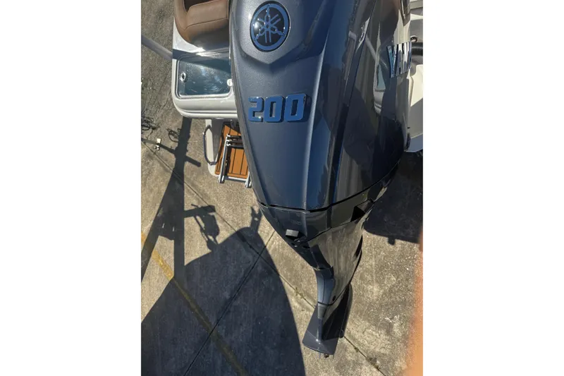Slide: The Image of 2026 Pioneer 222 Islander with Yamaha 200 outboard motor, viewed from above. - 14