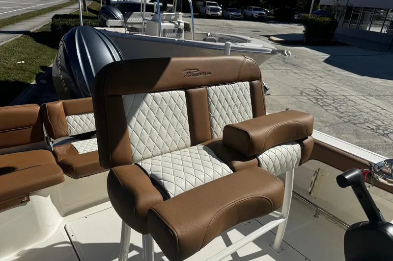 Slide: The Image of 2026 Pioneer 222 Islander boat seat with brown and white quilted upholstery. - 16