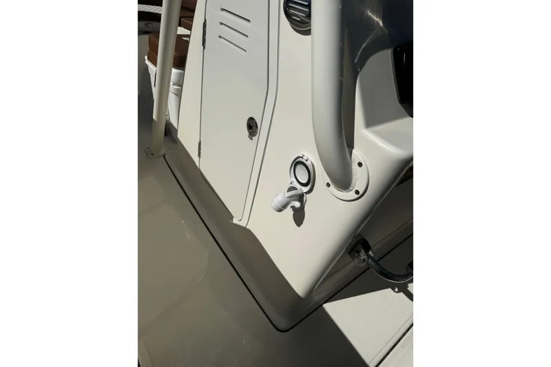 Slide: The Image of Close-up of 2026 Pioneer 222 Islander boat interior, showcasing sleek design and control panel. - 23