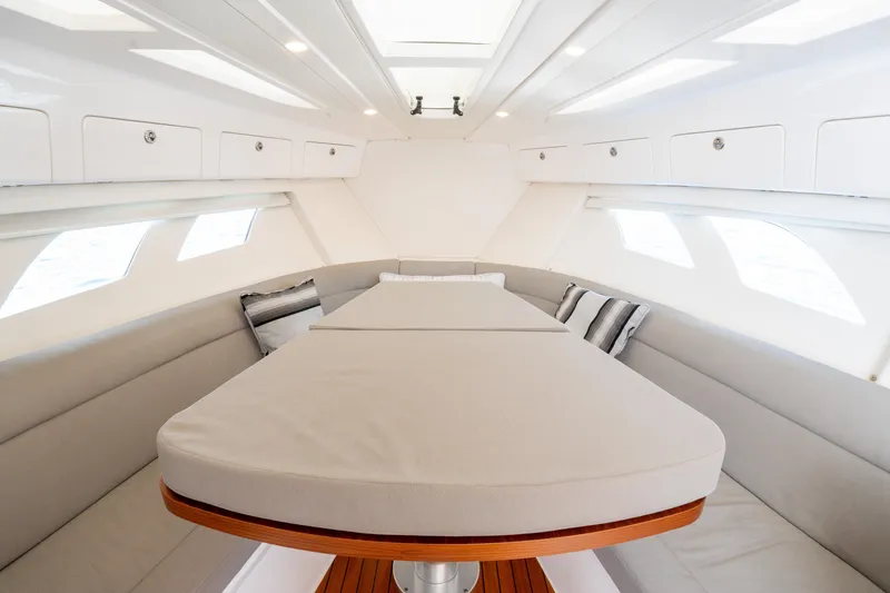 Slide: The Image of Interior of 2019 Intrepid 407 Cuddy, featuring a cozy seating area and modern design. - 35