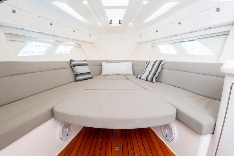 Slide: The Image of Luxurious interior of 2019 Intrepid 407 Cuddy boat with plush seating and elegant design. - 37