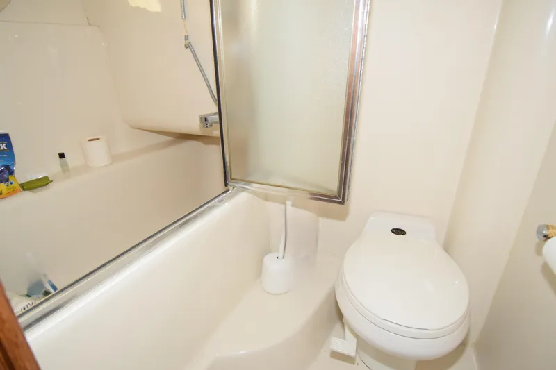 Slide: The Image of Bathroom interior of 1999 Bayliner 5288 yacht with shower and toilet. - 14