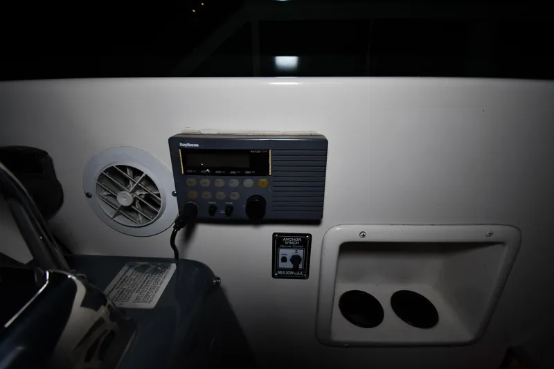 Slide: The Image of Control panel on a 1994 Tiara Yachts 4300 Open, featuring Raytheon equipment. - 11