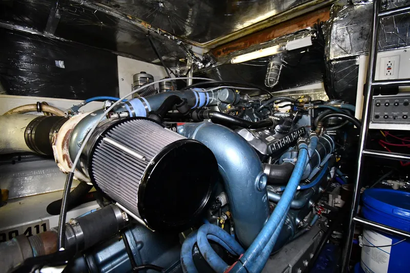 Slide: The Image of Engine room of a 1994 Tiara Yachts 4300 Open, showcasing detailed machinery. - 43