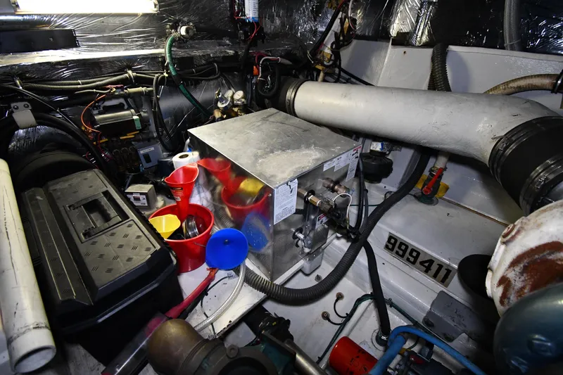 Slide: The Image of Engine room of a 1994 Tiara Yachts 4300 Open, featuring various mechanical components. - 45