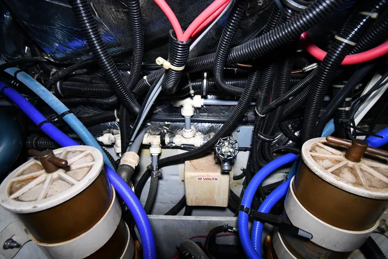 Slide: The Image of Engine room of 1994 Tiara Yachts 4300 Open with wiring and components. - 50