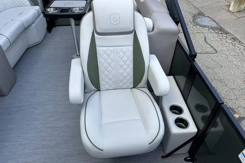 Slide: The Image of Luxurious seating on 2026 Godfrey Sweetwater 2286 SBC pontoon boat with cup holders. - 11