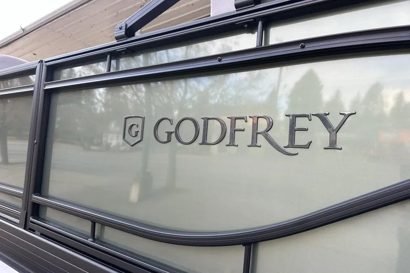 Slide: The Image of 2026 Godfrey Sweetwater 2286 SBC boat logo on side panel. - 3
