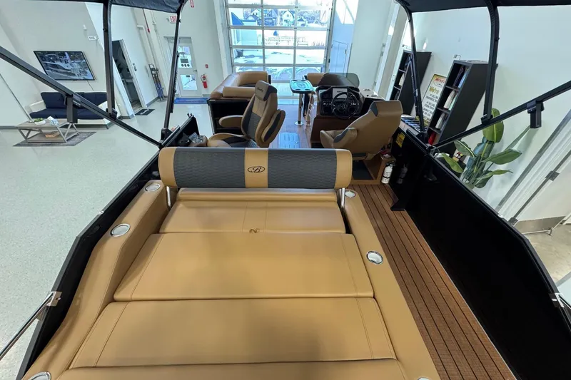 Slide: The Image of 2026 Bentley Pontoons Elite 223 Swingback interior with luxurious seating and modern design. - 6