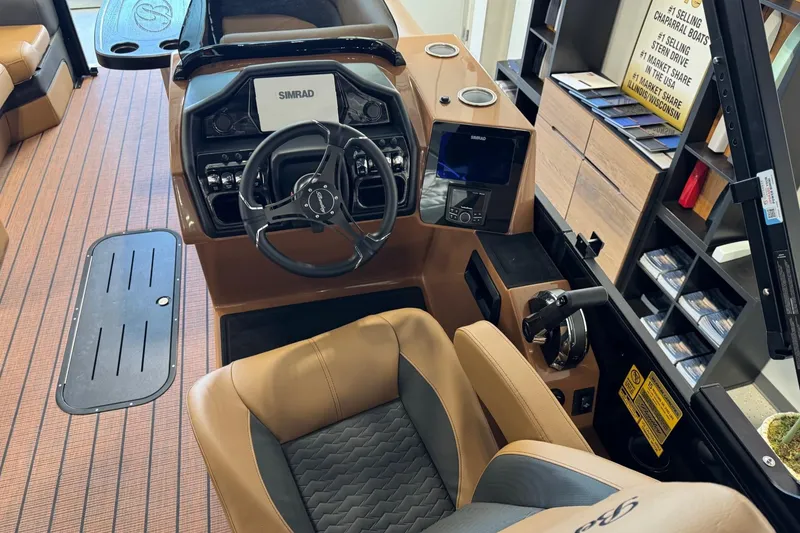 Slide: The Image of Interior of 2026 Bentley Pontoons Elite 223 Swingback with modern steering and controls. - 9