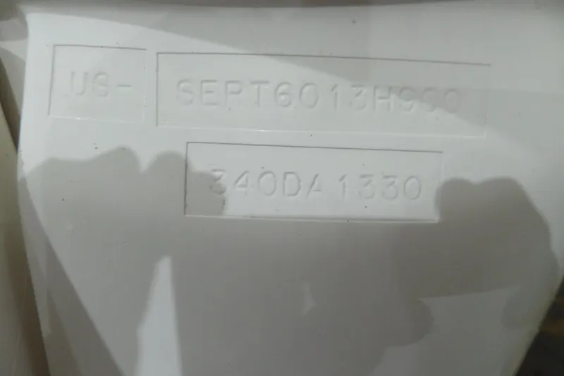 Slide: The Image of Interior of 2000 Sea Ray 340 Sundancer with seating and marine equipment. - 12