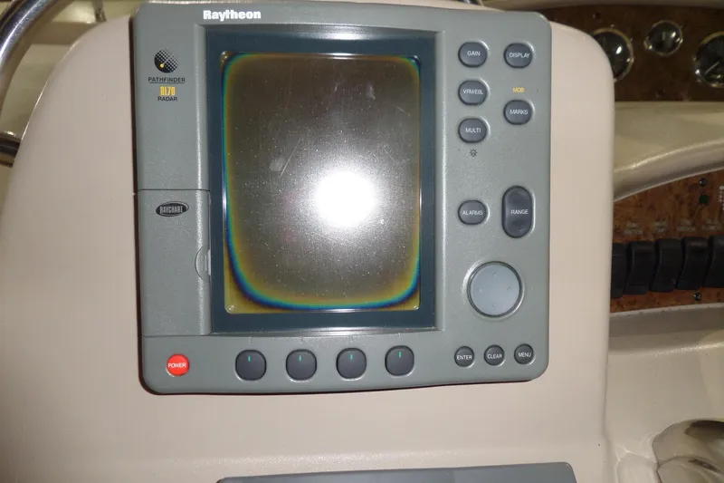 Slide: The Image of Raytheon radar display on 2000 Sea Ray 340 Sundancer boat dashboard. - 25