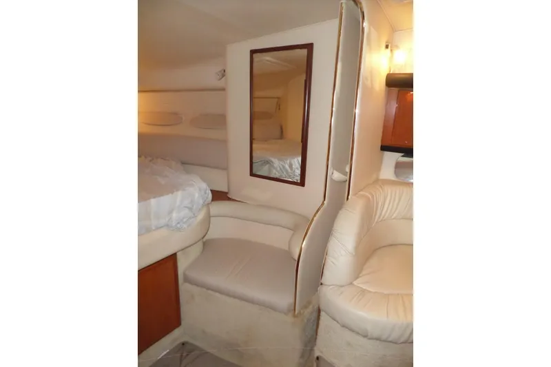 Slide: The Image of Interior of 2000 Sea Ray 340 Sundancer yacht with seating and mirror. - 41
