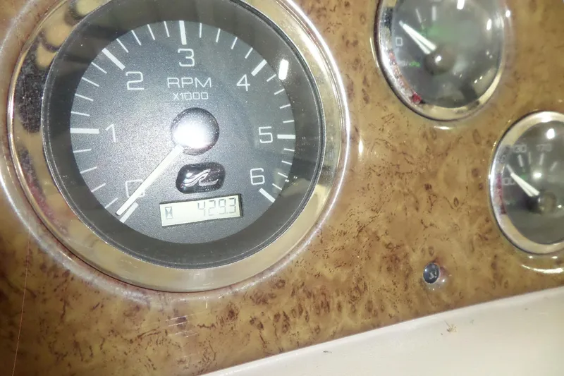 Slide: The Image of Close-up of 2000 Sea Ray 340 Sundancer RPM gauge, showing 4293 hours. - 57