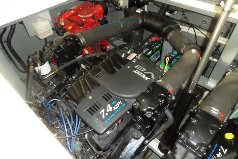 Slide: The Image of Engine compartment of a 2000 Sea Ray 340 Sundancer with 7.4L V8 engine. - 60