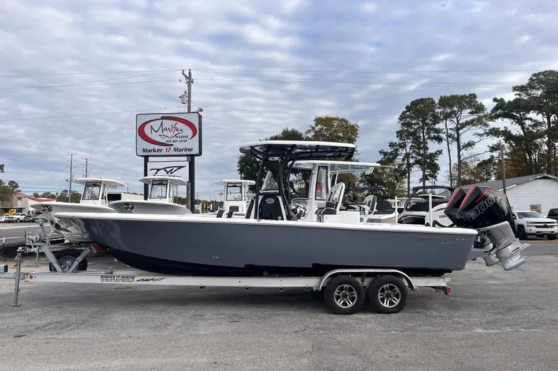 Slide: The Image of 2023 Tidewater 2700 Carolina Bay boat on trailer at Marker 17 Marine dealership. - 0