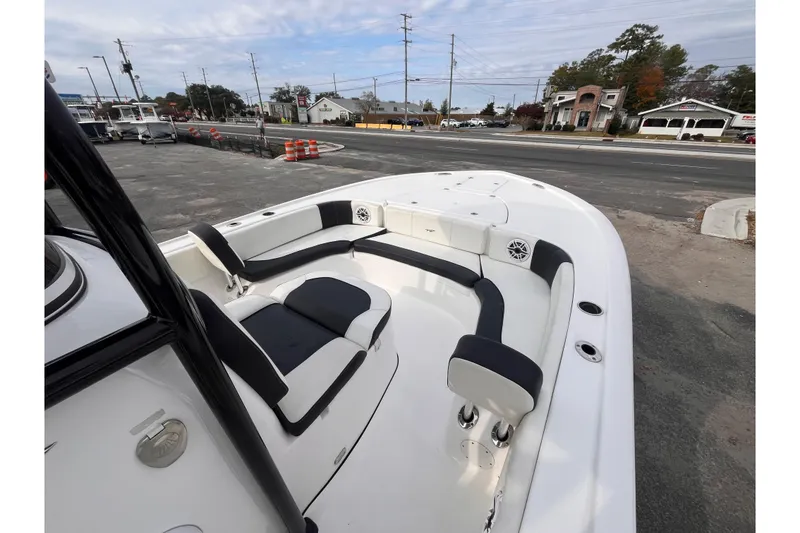 Slide: The Image of 2023 Tidewater 2700 Carolina Bay boat with spacious seating and modern design. - 10