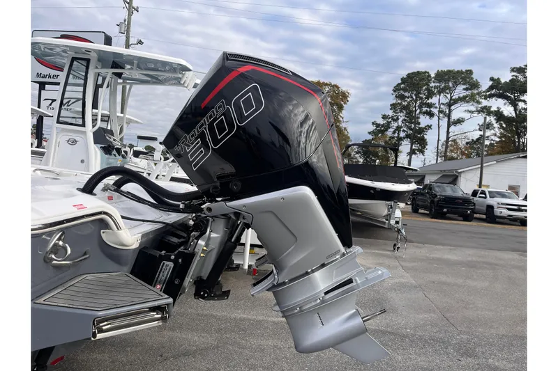 Slide: The Image of 2023 Tidewater 2700 Carolina Bay boat with powerful Racing 300 outboard motor. - 3