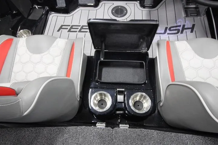 Slide: The Image of 2026 BassCat Cougar FTD SP interior with dual cup holders and storage compartment. - 20