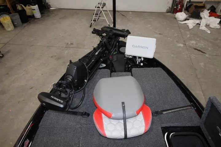 Slide: The Image of 2026 BassCat Cougar FTDSP boat interior with Garmin equipment and seating. - 21