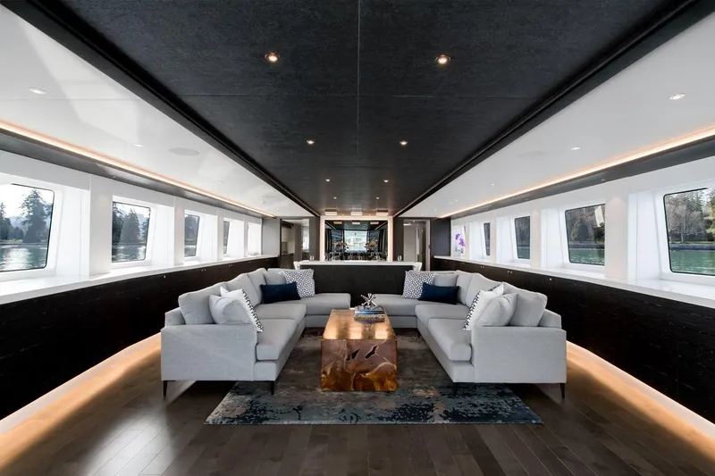 Slide: The Image of Luxurious interior of 2019 Crescent Semi-Displacement yacht with modern sofas and panoramic windows. - 4