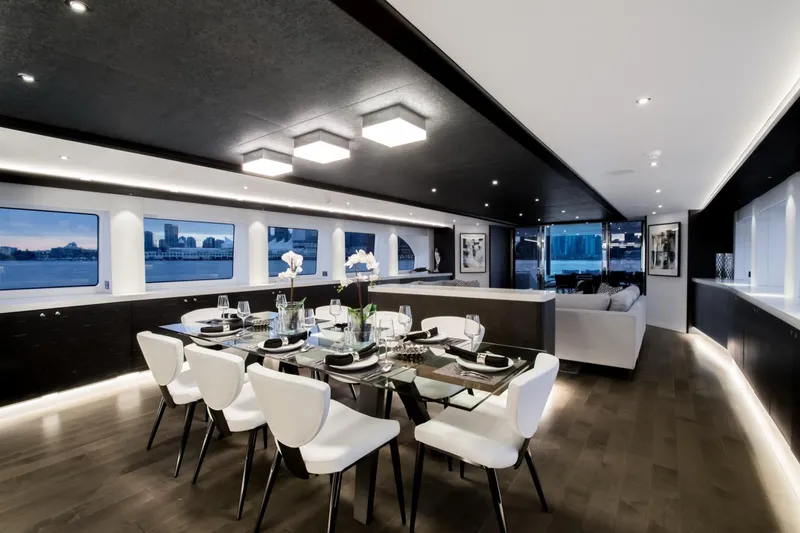 Slide: The Image of Luxurious dining area on 2019 Crescent Semi-Displacement yacht with elegant decor and waterfront views. - 6