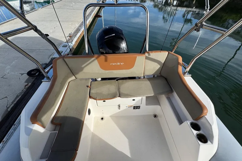 Slide: The Image of Zodiac Medline 6.8 boat interior with cushioned seating, 2022 model. - 10