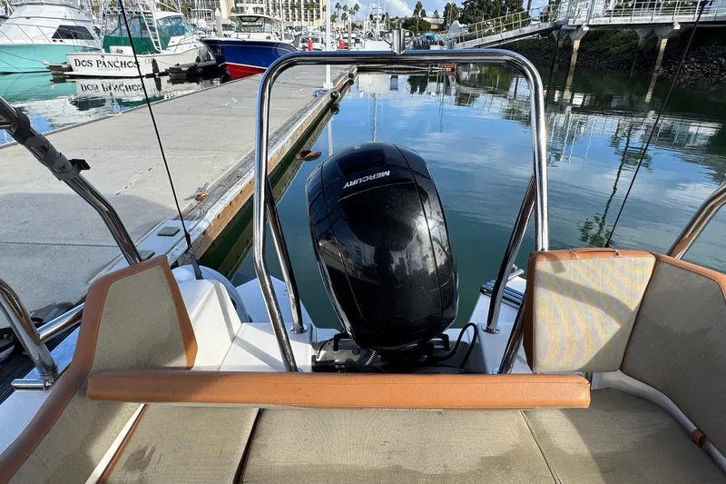 Slide: The Image of 2022 Zodiac Medline 6.8 boat with Mercury engine docked at marina. - 18