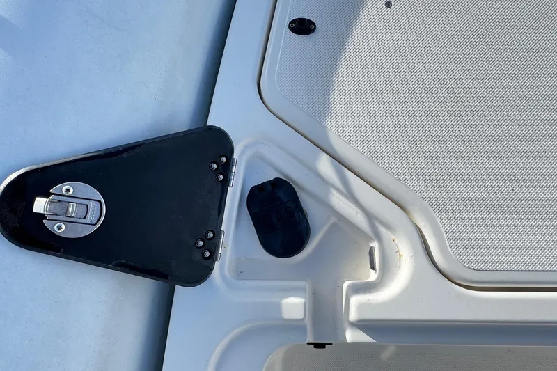 Slide: The Image of Zodiac Medline 6.8 boat deck detail, featuring a latch and textured surface, 2022 model. - 39