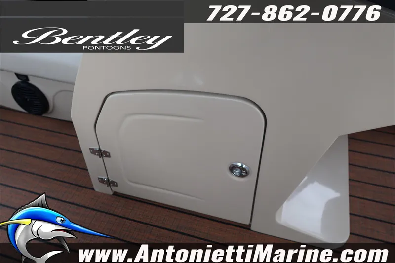 Slide: The Image of 2026 Bentley Pontoons Legacy 223 DL Navigator interior detail with wood finish. - 17