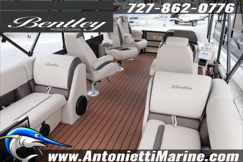 Slide: The Image of 2026 Bentley Pontoons Legacy 223 DL Navigator interior with luxurious seating and wood flooring. - 22