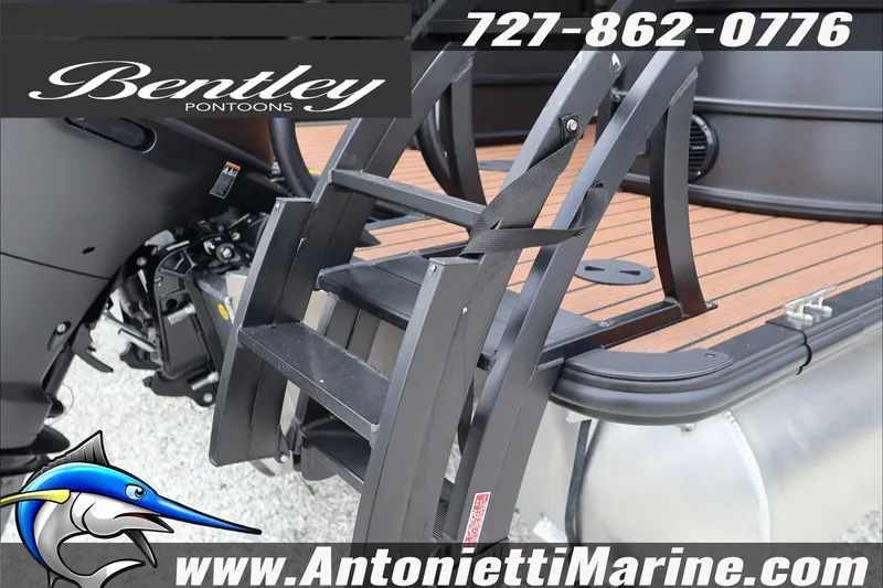 Slide: The Image of Bentley Pontoons Legacy 223 DL Navigator 2026 with ladder and deck details. - 24