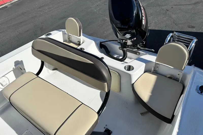 Slide: The Image of Cup holder on 2021 Key Largo 1801 boat, featuring white and beige interior. - 14
