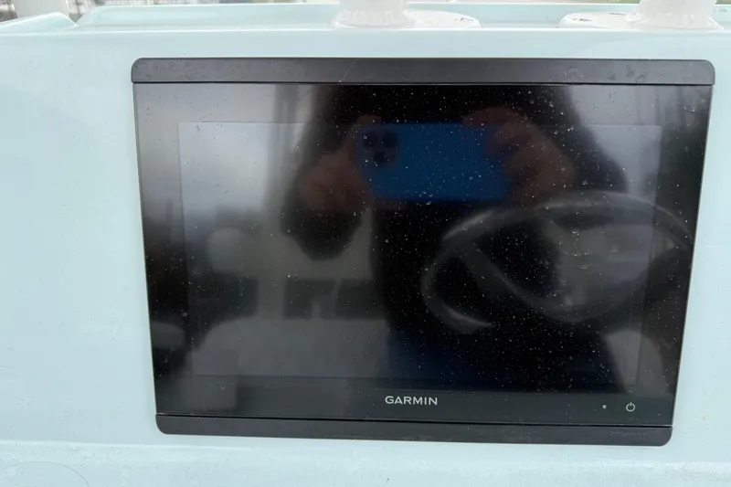 Slide: The Image of Garmin display on 2023 Shallow Sport 25 X3 boat dashboard. - 16