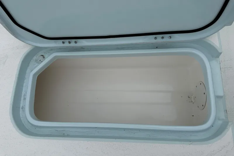 Slide: The Image of Open storage compartment in 2023 Shallow Sport 25 X3 boat. - 47