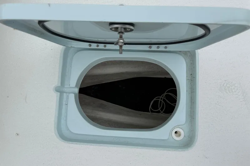 Slide: The Image of Open hatch on 2023 Shallow Sport 25 X3 boat deck. - 49